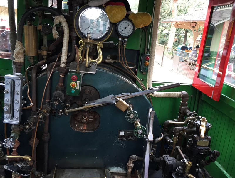 Interior of Disneyland Steam locomotive. Gauges, handles, levers.  